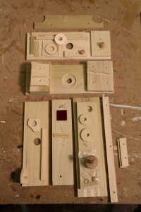 the 37 parts that make up a 120 roll film camera