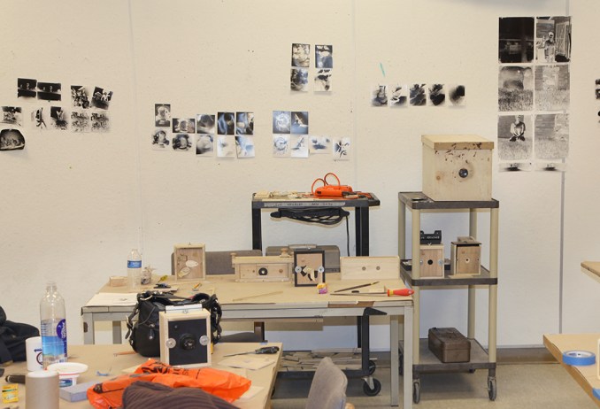 workshop classroom with cameras and paper tests